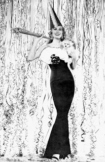 Anita Ekberg e un cane festeggiano il nuovo anno