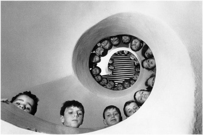 "Children over a Fibonacci Spiral Staircase" by Henri Cartier-Bresson circa 1900