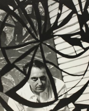 Enrico Baj's portrait on a mirror , ca. 1960. Fotografia di Ugo Milas