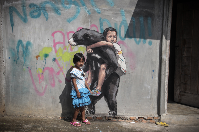 Ernest Zacharevic @Bukit Lawang - Photo Credit Ernest Zacharevic