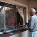 Larry Sultan – Pictures From Home – Conversation kitchen window, 1986
