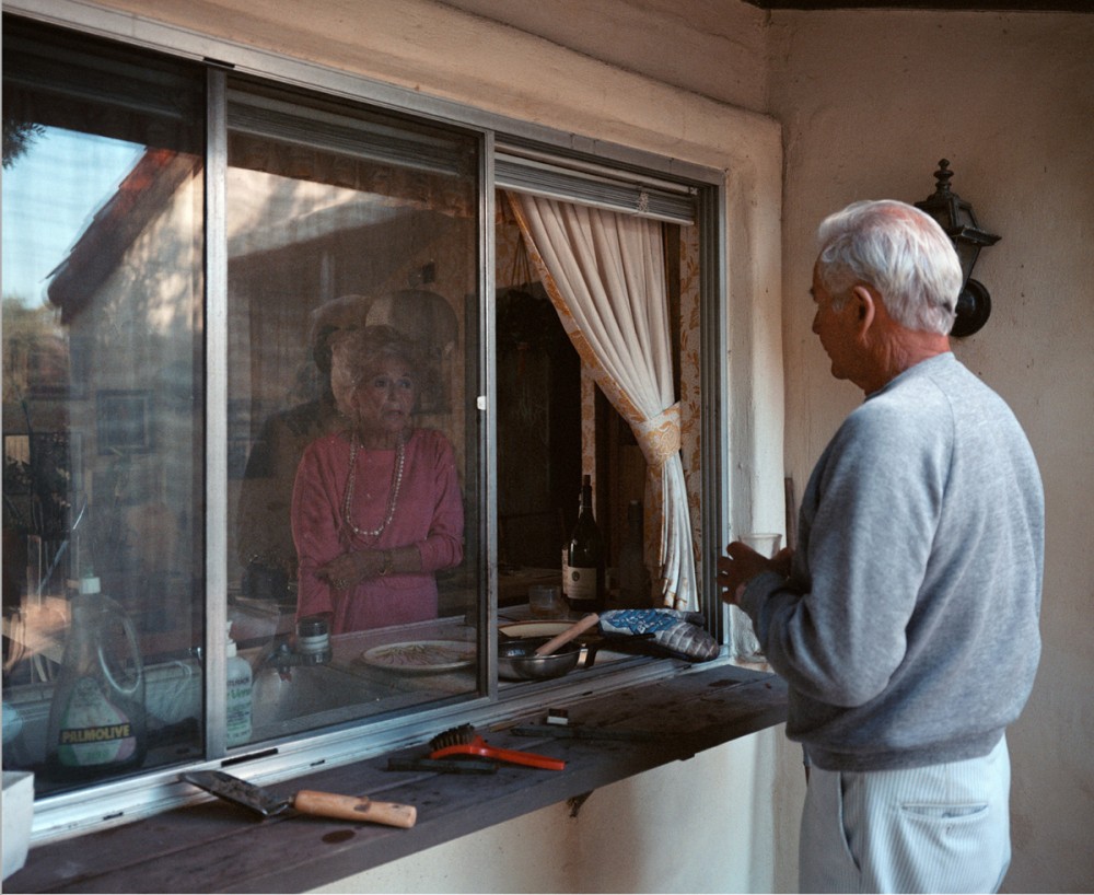 Larry Sultan - Pictures From Home - Conversation kitchen window, 1986