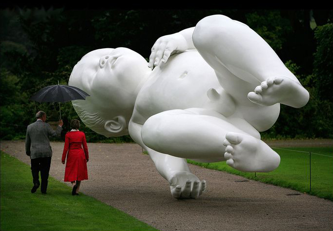 "Planet" (2008) by Marc Quinn (Painted bronze and steel - 398h x 926w x 353d cm)