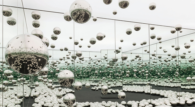 Yayoi Kusama, Infinity Mirrored Room—Let’s Survive Forever, 2017, wood, metal, glass mirrors, LED lighting system, monofilament, stainless steel balls, carpet, 10' 3“ x 20' 6” x 20' 5 1/4"