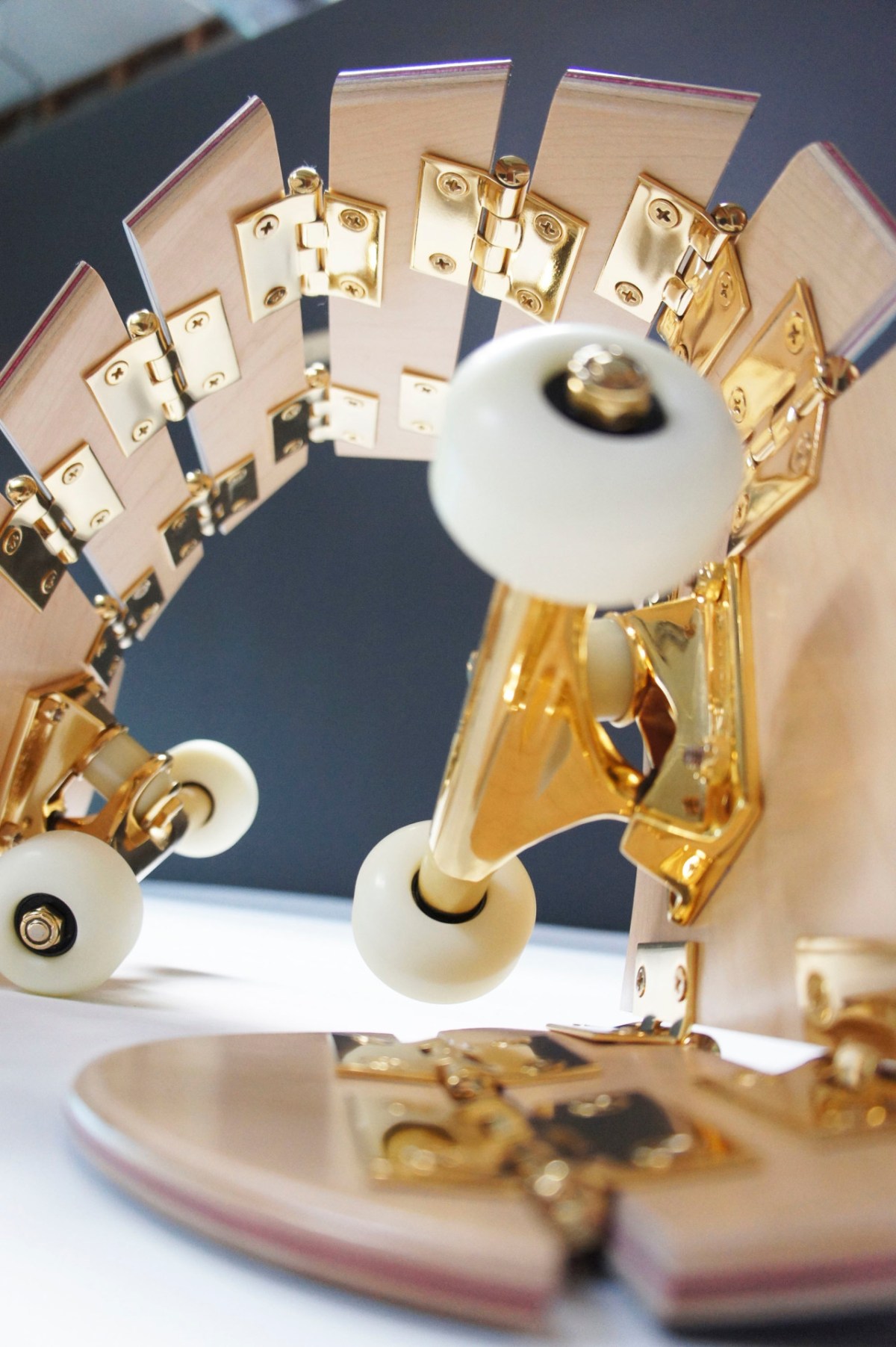 Darío Escobar - Untitled (2016), Ed. 1/4 A/P Wood, urethane, grip tape, steel, gold plating, 15.7 x 9 x 3.7 inches. Photo Credit: The Lapis Press, courtesy of the artist and Nils Stærk Gallery