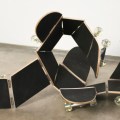 Darío Escobar – Untitled [Skateboard] (2011), wood, urethane, paint, stainless steel, 75 x 45 x 0.75 in. Photo courtesy of the artist and Josée Bienvenu Gallery