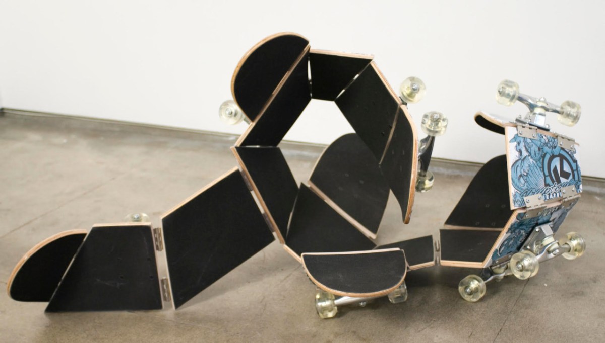 Darío Escobar - Untitled [Skateboard] (2011), wood, urethane, paint, stainless steel, 75 x 45 x 0.75 in. Photo courtesy of the artist and Josée Bienvenu Gallery