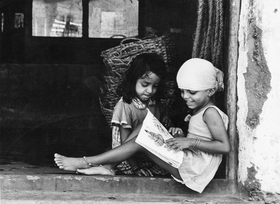 Museum number PHY.07748 T. S. Satyan, Homework after bath, 1978, H. 23.4 cm, W. 30.2 cm, Silver gelatin print
