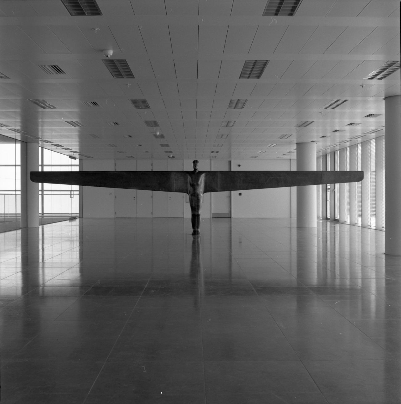 Antony Gormley, Case for an Angel II, 1990, in the exhibition ‘Air and Angels’, ITN Building, 200 Gray’s Inn Road, London, 1994. Photography by Edward Woodman