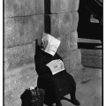SPAIN. Madrid. 1955. Plaza Mayor. Siesta of the lottery vendor.