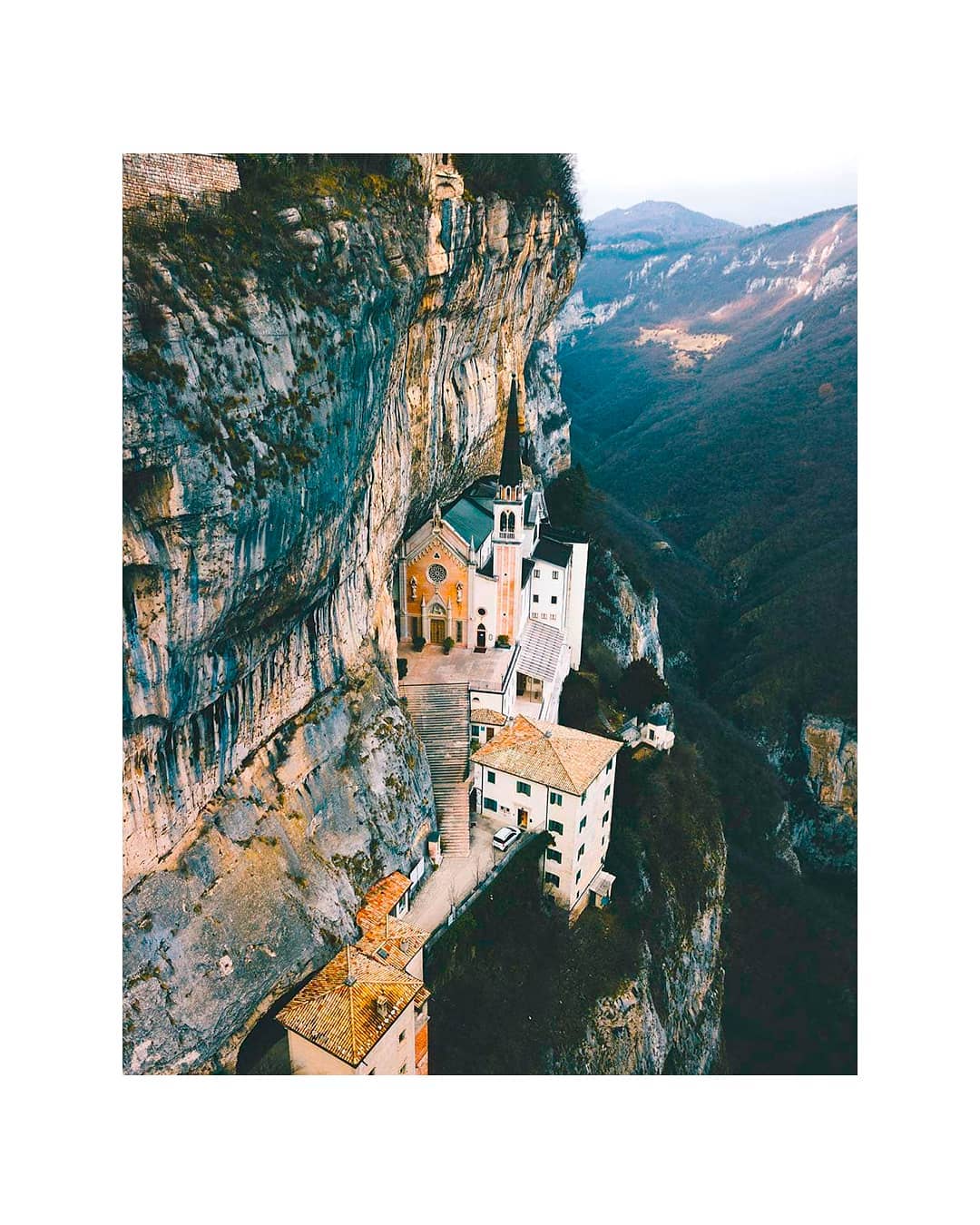 Santuario Madonna della Corona in Spiazzi, Verona, Italy. This church was carved into the mountain in 1625. Photography by Alessio Lin