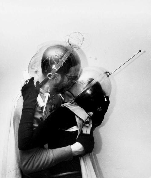 Boy Meets Girl - From Mars A young man and woman with bubble helmets "kiss", New York, New York, mid 1950s. (Photo by Weegee (Arthur Fellig) International Center of Photography/Getty Images)