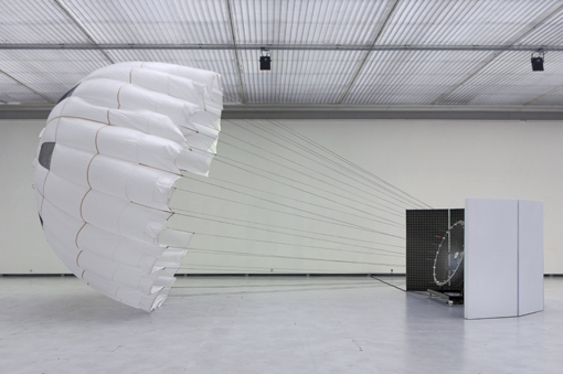 Pionier (2011) by Carsten Nicolai @ - Pace Gallery, New York Pionier I, a white silk parachute inflated with a wind machine, and raster gradient, a large-scale black-and-white gradient that optically expands and contracts the space of the gallery.