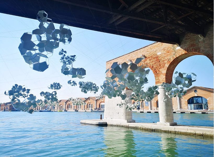 Aero(s)cene by Tomás Saraceno @ Biennale Arte 2019 - The aero(s)cene installation at the gaggiandre of the arsenale addresses the rising sea phases of global warming image © designboom