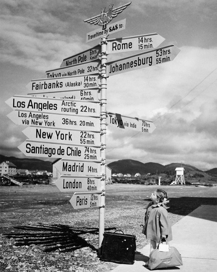 Little girl by the signpost at Bodö Airport, Norway, 1968. Photograph via SAS Scandinavian Airlines.