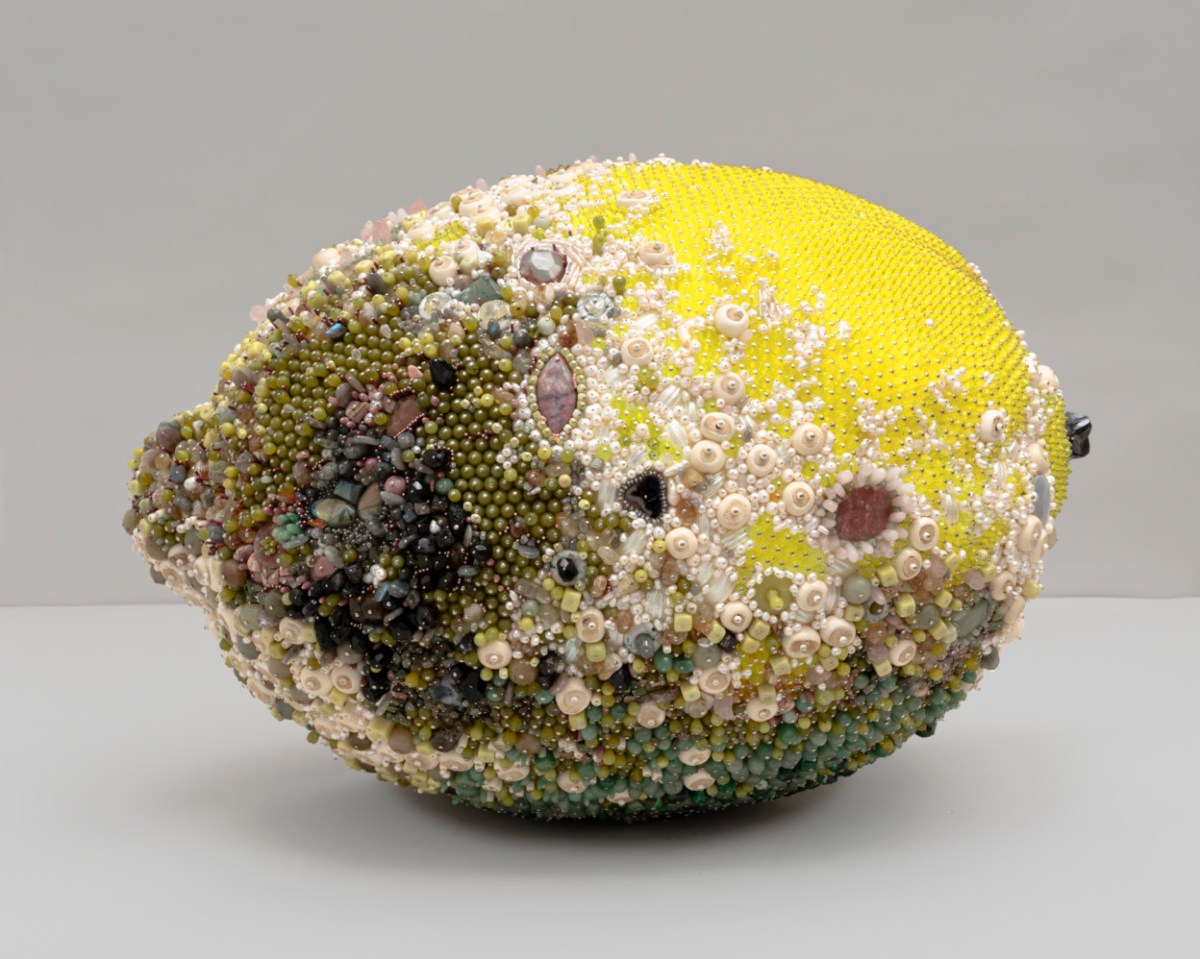 “Bad Lemon (Sour Sparkle)” (2019), serpentine, aventurine, labradorite, rhodonite, rhodochrosite, pink aventurine, rose quartz, black onyx, citrine, unakite, tektite, smoky quartz, quartz, carnelian, limestone, pink lepidolite, tree agate, red agate, grey agate, black agate, breccicated jasper, hematite, mother of pearl, bone, freshwater pearl, 19 3/4 x 20 x 29 in