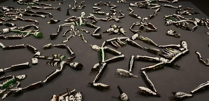 Fiona Hall, Lay me down, 2018-19 oil paint on glass site specific installation, 10 x 450 x 700 cm (approx.), courtesy l’artista e PAC