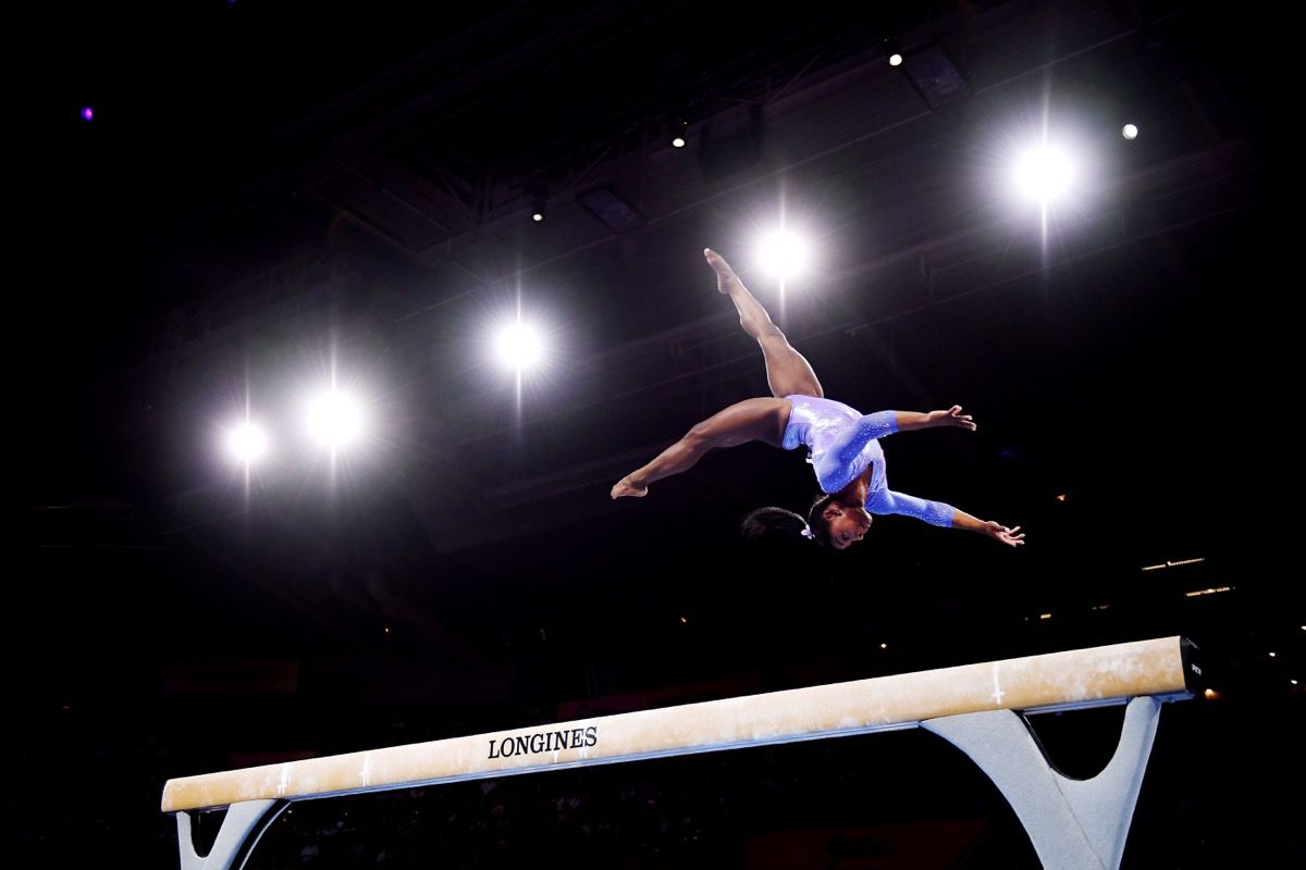 STUTTGART, GERMANY - OCTOBER 13: Simone Biles of The United States competes in Women's Balance beam Final during day 10 of the 49th FIG Artistic Gymnastics World Championships at Hanns-Martin-Schleyer-Halle on October 13, 2019 in Stuttgart, Germany. (Photo by Laurence Griffiths/Getty Images)