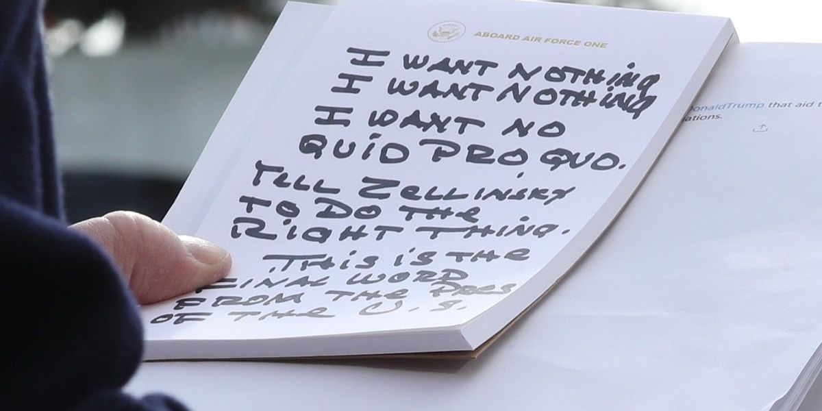 WASHINGTON, DC - NOVEMBER 20: U.S. President Donald Trump holds his notes while speaking to the media before departing from the White House on November 20, 2019 in Washington, DC. President Trump spoke about the impeachment inquiry hearings currently taking place on Capitol Hill. (Photo by Mark Wilson/Getty Images)