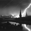 Overall of central Moscow w. antiaircraft gunners dotting sky over Red Sq. w. exploding shells w. spires of Kremlin silhouetted by German Luftwaffe flare. (Photo by Margaret Bourke-White/The LIFE Picture Collection via Getty Images)