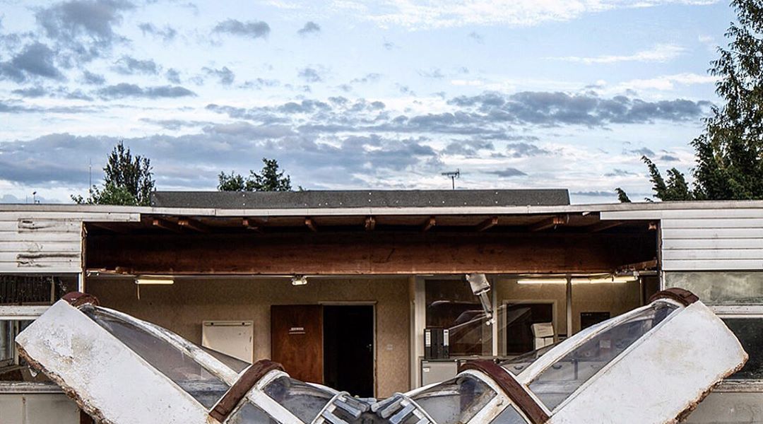 "Out of office" by Alex Chinneck