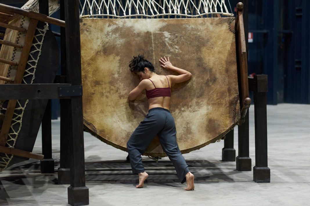 Chen Zhen Jue Chang, Dancing Body – Drumming Mind (The Last Song), 2000 Installation view and performance, Pirelli HangarBicocca, Milan, 2020, PINAULT COLLECTION © ADAGP, Paris Courtesy Pirelli HangarBicocca, Milan Photo: Francesco Margaroli