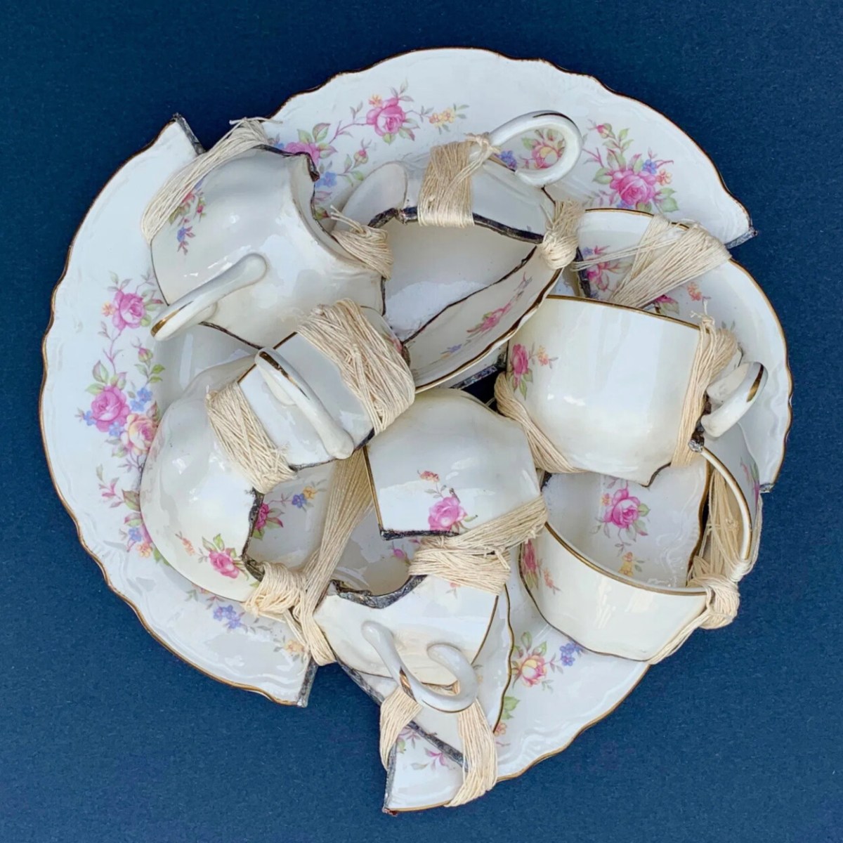 "Broken cups and saucers" by Glen Taylor