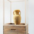 “The Honeycomb Amphora” (2020), natural beeswax, museum glass, wood, re-used beehives , 47 x 42 x 147 centimeters. All images © Tomáš Libertíny