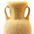 “The Honeycomb Amphora” (2020), natural beeswax, museum glass, wood, re-used beehives , 47 x 42 x 147 centimeters. All images © Tomáš Libertíny