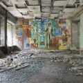ost Office, Pripyat. The mural illustrates the evolution of communication, from stone tablets and scrolls, to mail trains and finally a Soviet cosmonaut. Chernobyl Exclusion Zone by Darmon Richter