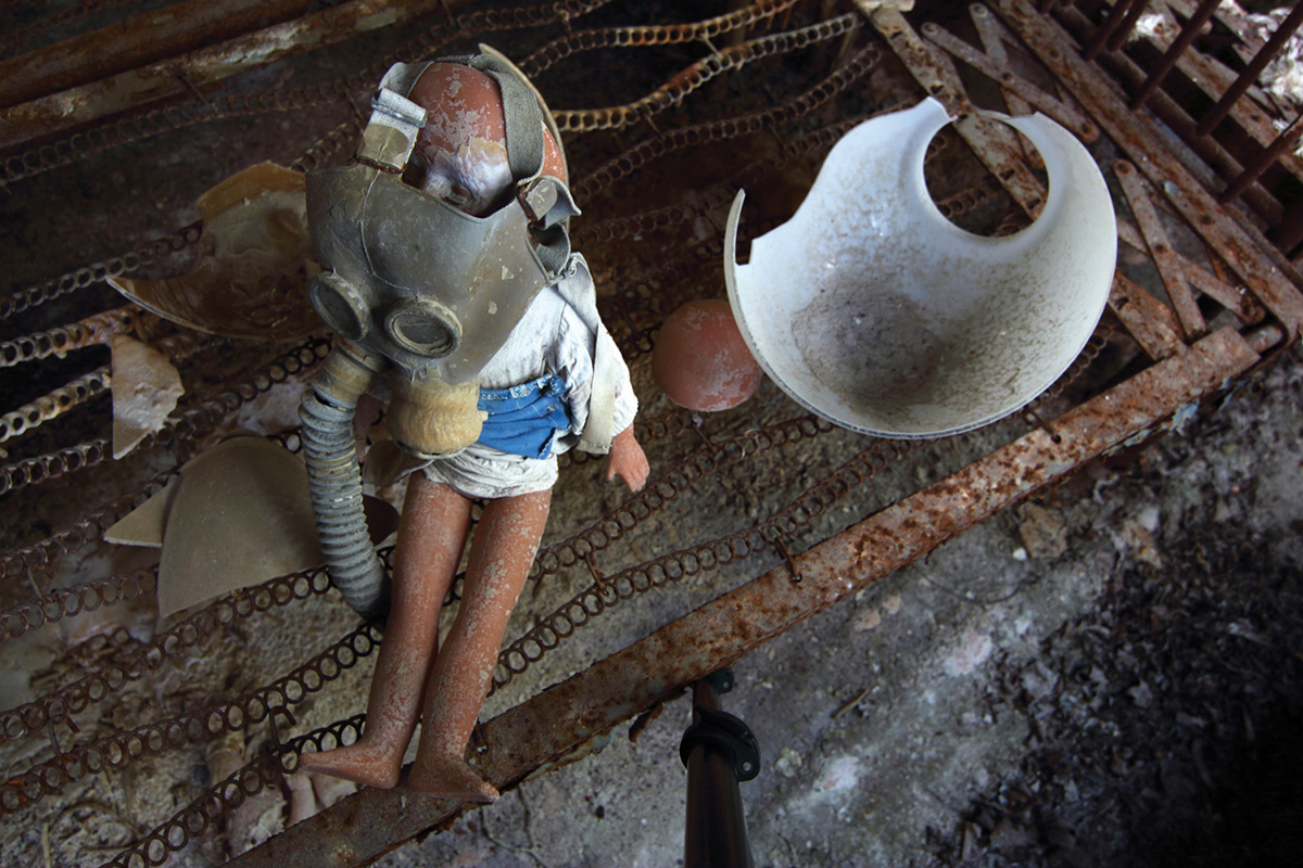 Kindergarten No.7 ‘Zolotoy Klyuchik’ (‘Golden Key’), Pripyat. Discarded artefacts are arranged into unlikely dioramas by visitors. Chernobyl Exclusion Zone by Darmon Richter
