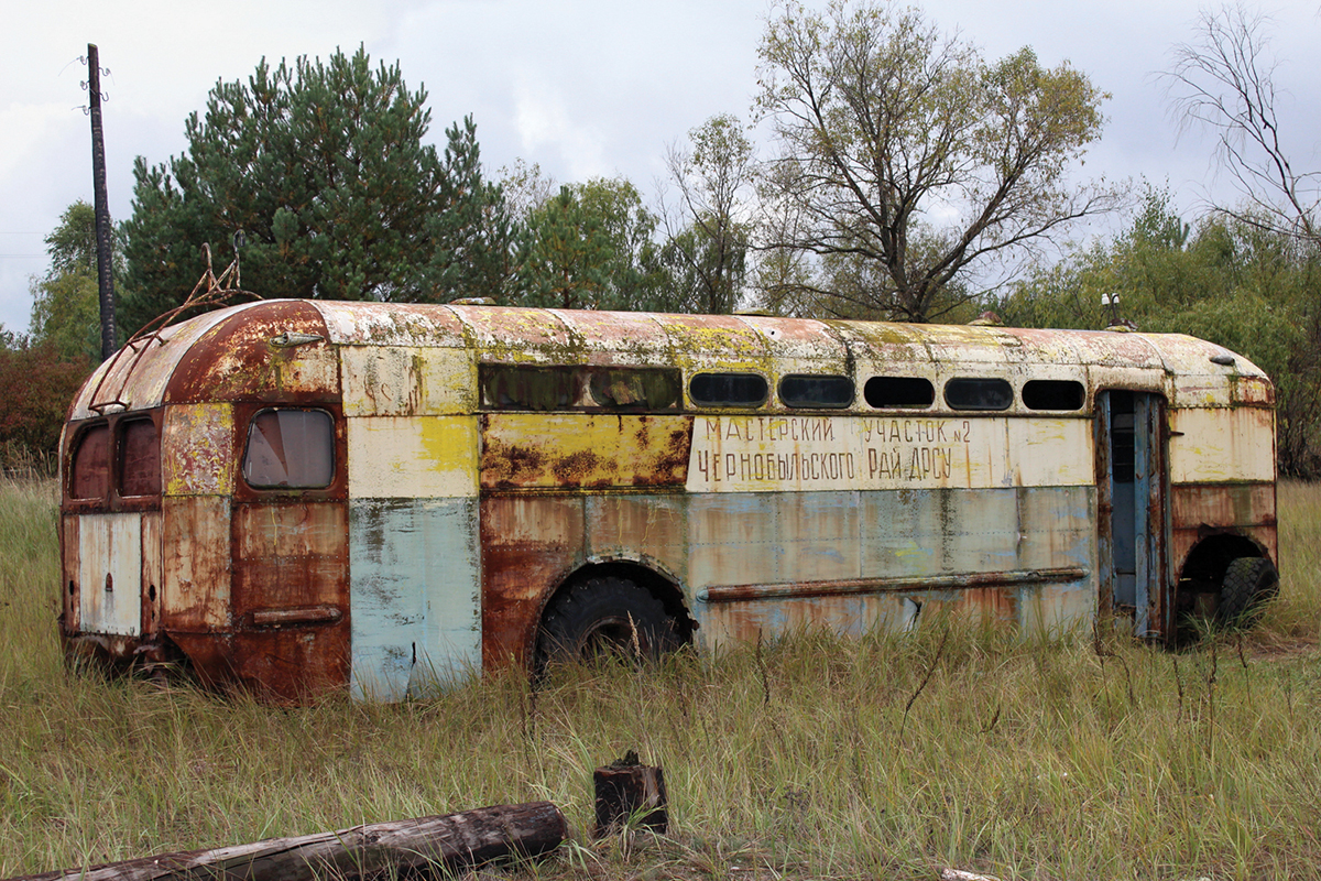 Abandoned trolleybus, Kopachi, Chernobyl Exclusion Zone. This highly contaminated village was mostly bulldozed after the disaster. In April 2020 this vehicle was severely damaged by forest fires. Chernobyl Exclusion Zone by Darmon Richter