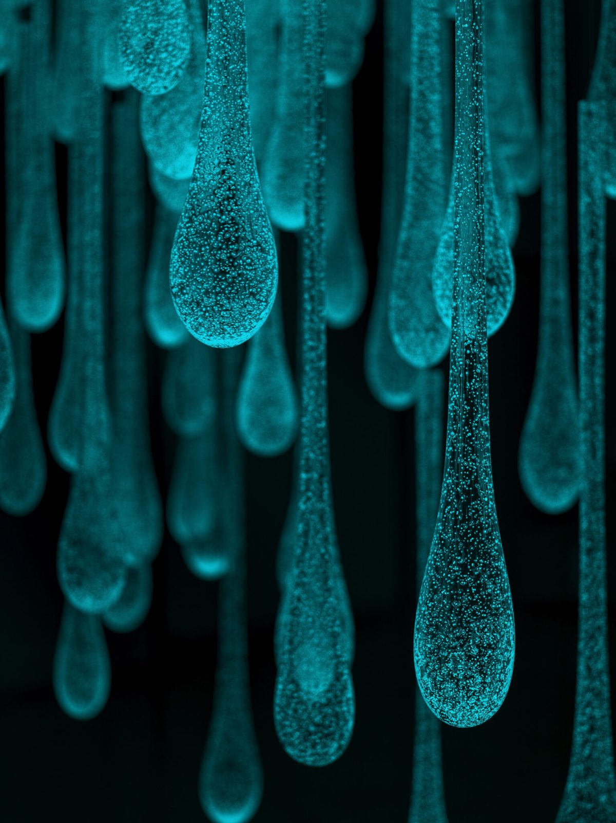 Rui Sasaki. Detail of “Liquid Sunshine/I am a Pluviophile” (2019), glass, phosphorescent material, broad-spectrum UV lights, motion detector, 3,353 x 4,267 x 3,658 millimeters as installation. Photo by Yasushi Ichikawa, 33rd Rakow Commission, courtesy of The Corning Museum of Glass