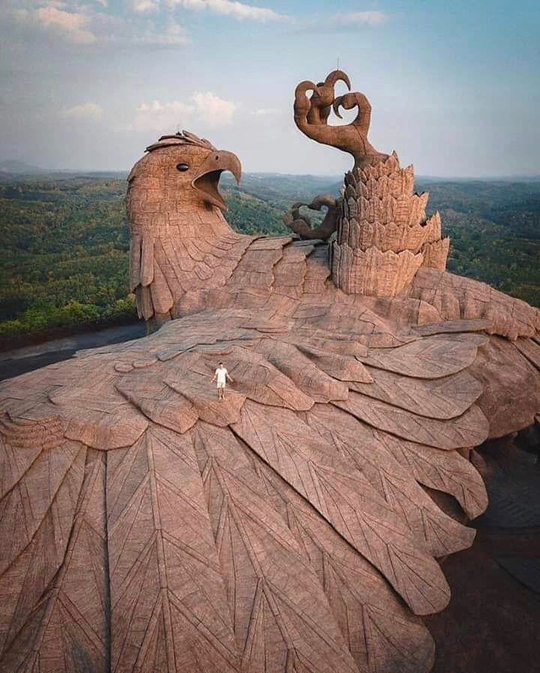 Artist Rajiv Anchal and a team of experience sculptors installed an enormous concrete bird named Jatayu, the largest bird sculpture in the world, atop the rolling hills of Chadayamangalam in the Kollam district of Kerala, India