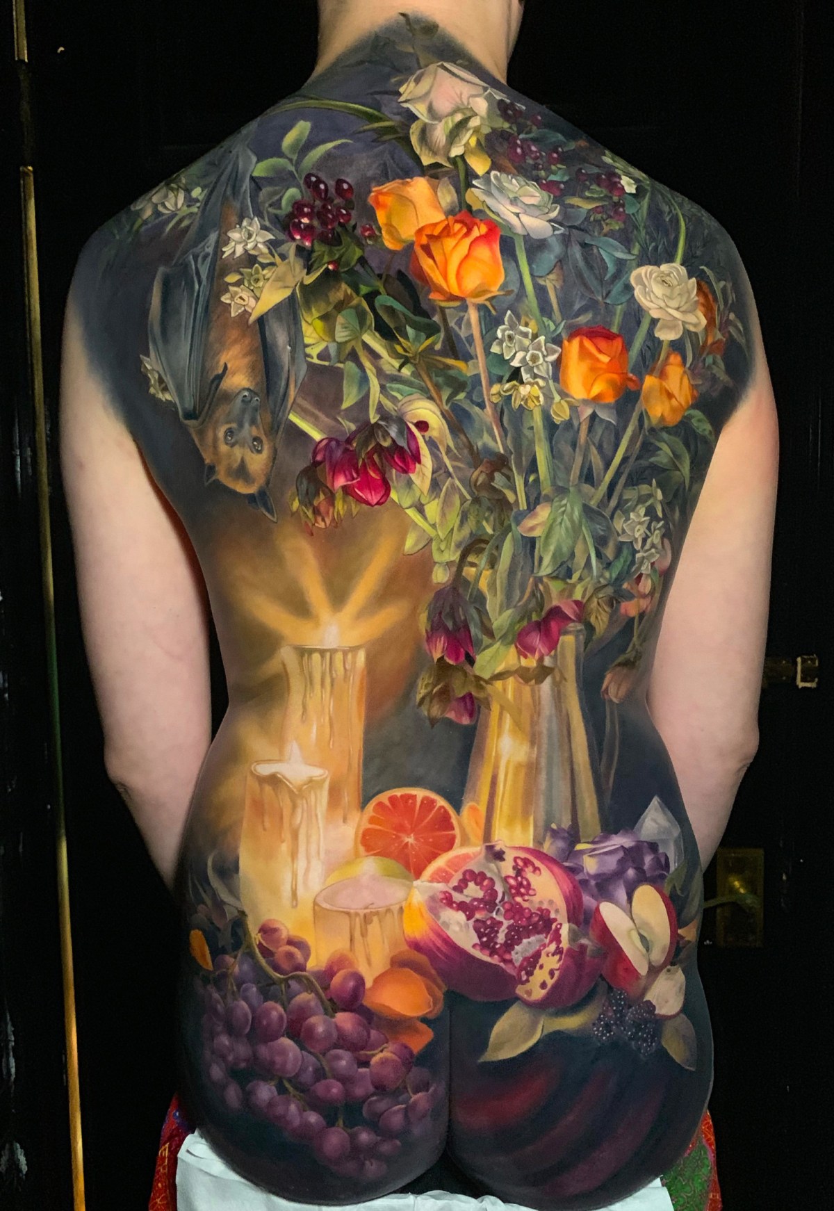 Elaborate chiaroscuro tattoo by Makkala Rose