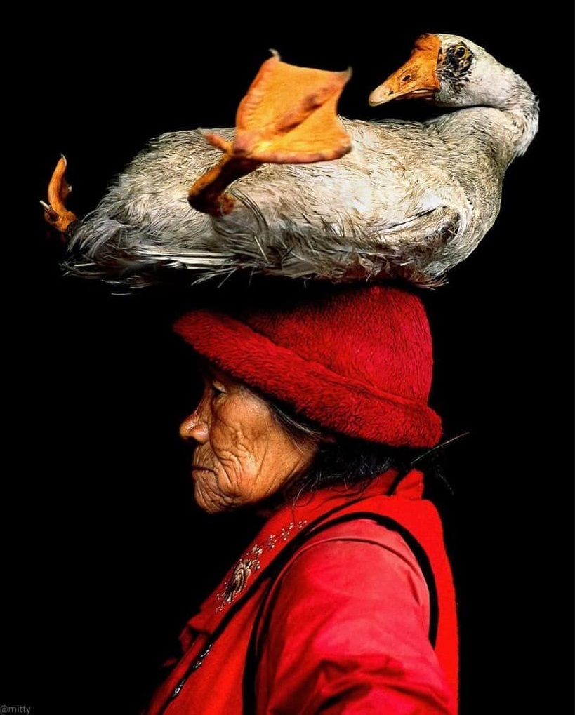 Lady with the Goose by Cristina Mittermeier