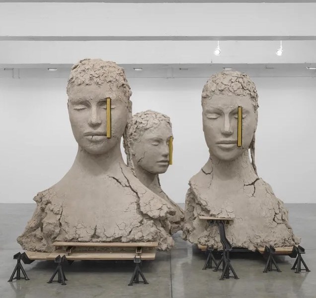 "Composition with Four Yellow Verticals" by Mark Manders