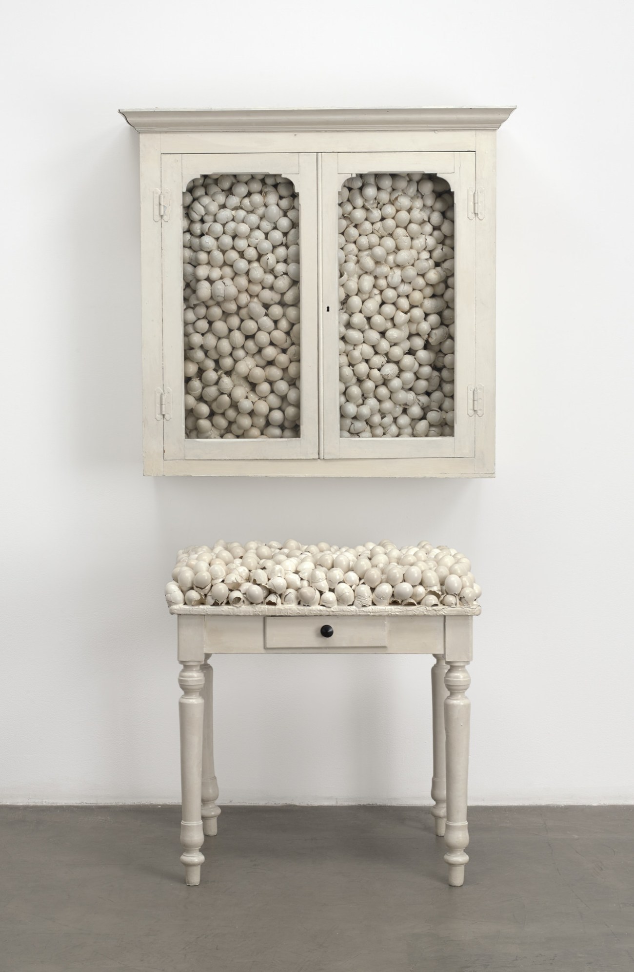"White Cabinet and White Table" by Marcel Broodthaers