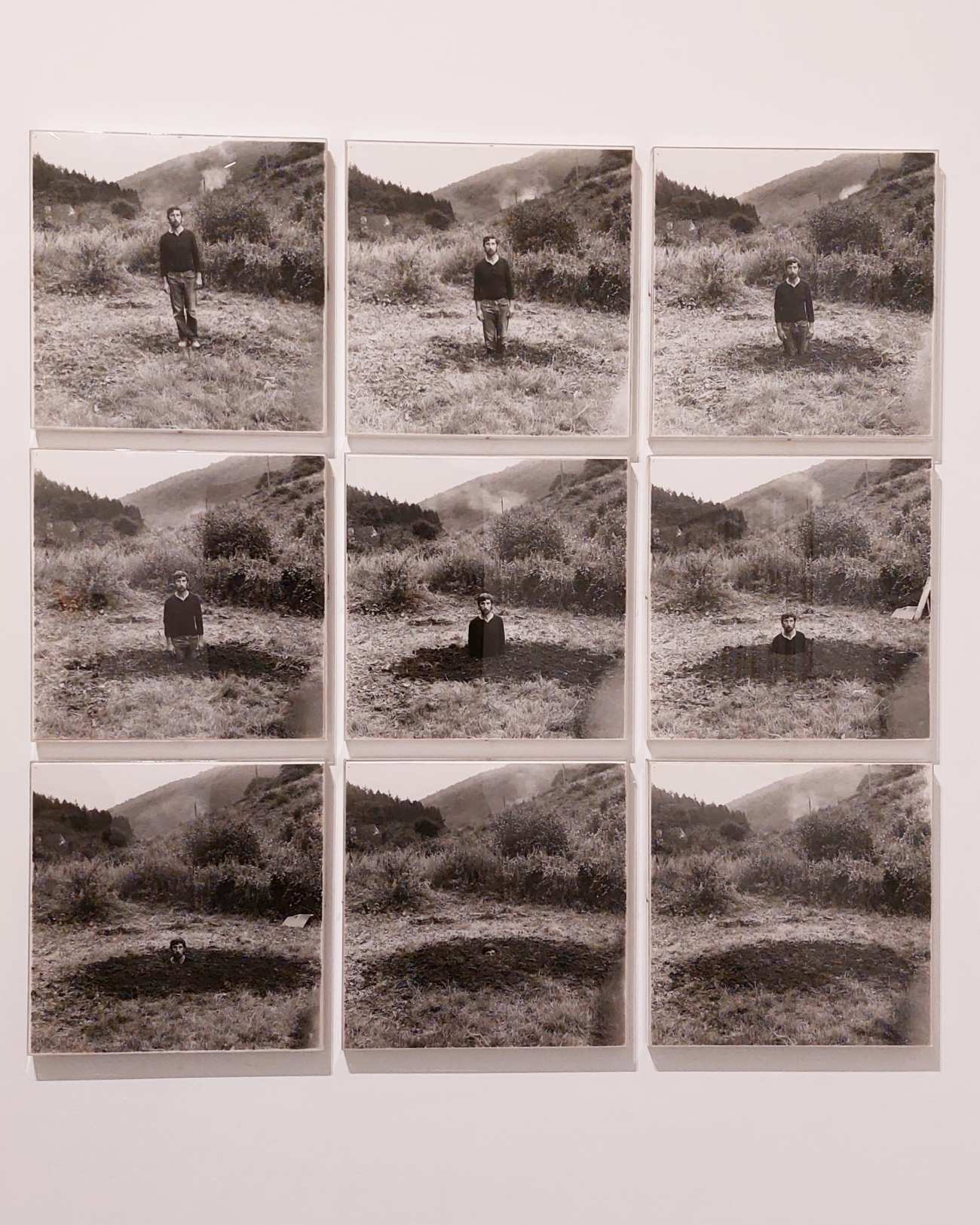 "Self-Burial (Television Interference Project)" by Keith Arnatt