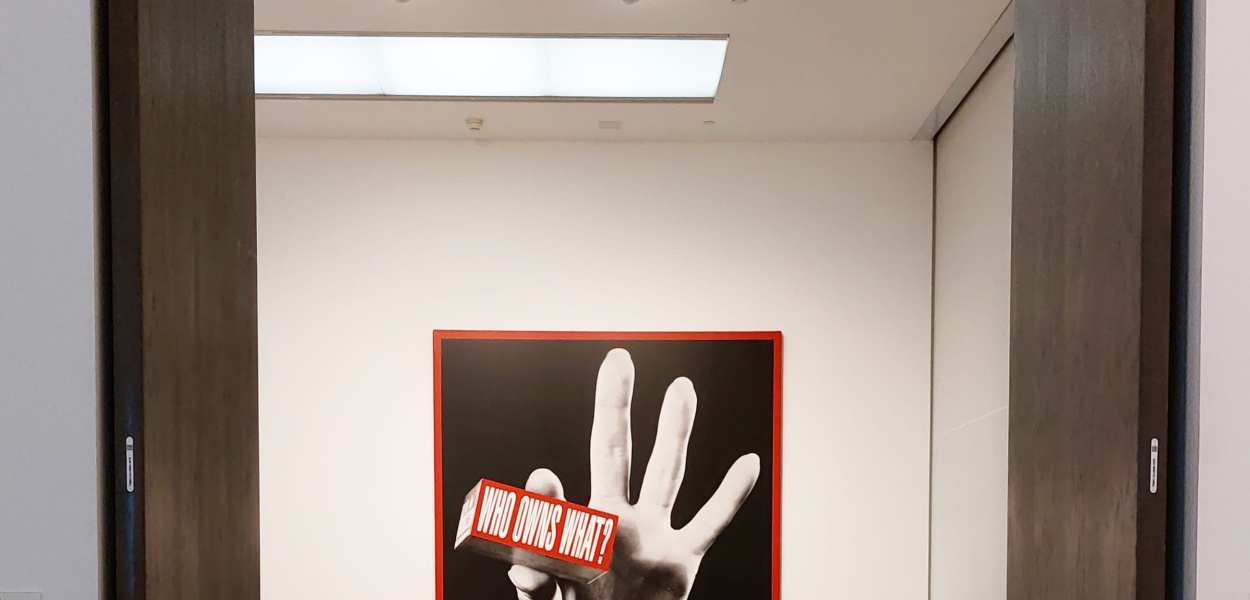 "Who owns what?" by Barbara Kruger